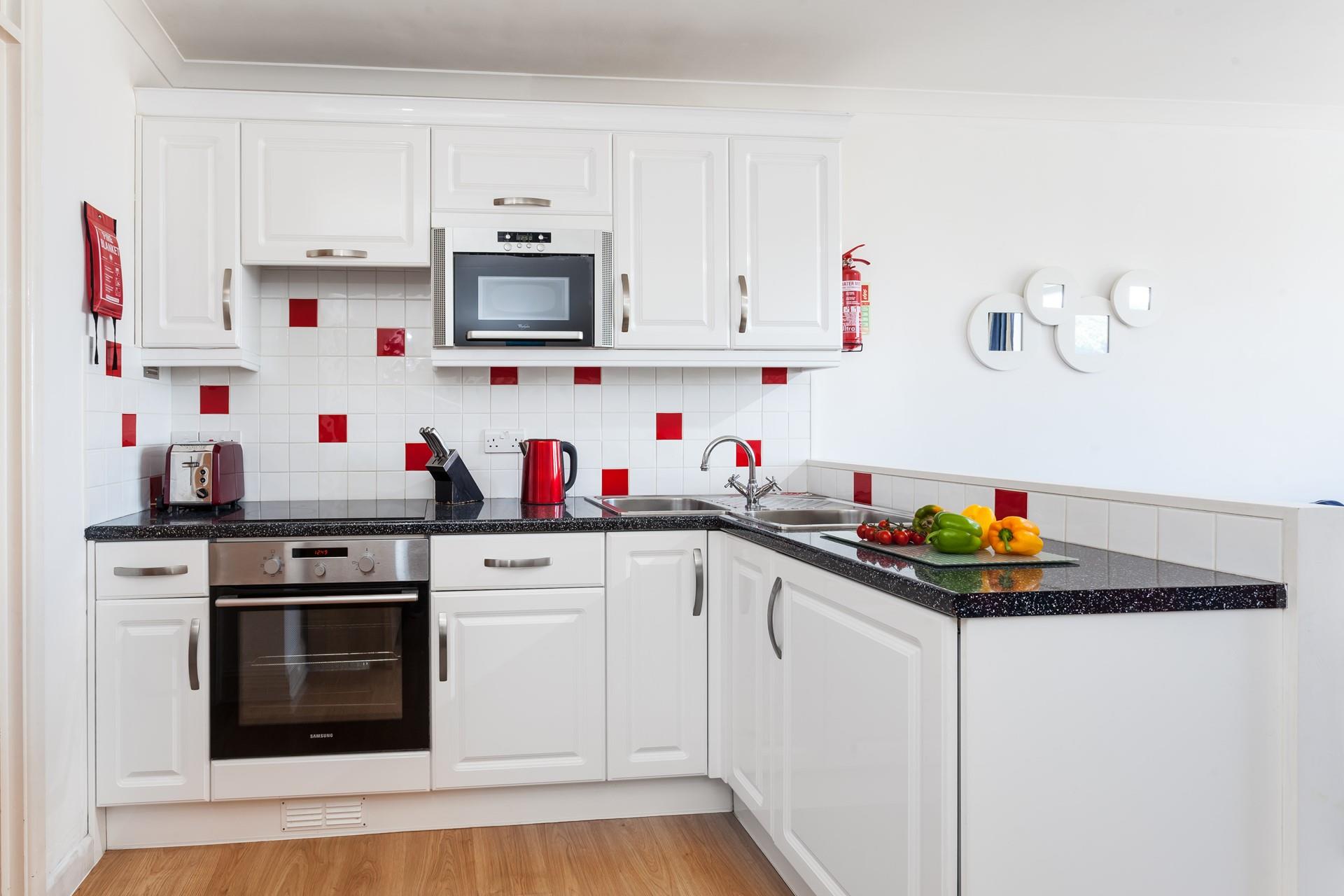 Whether you choose to cook or eat out, the kitchen has all you need.