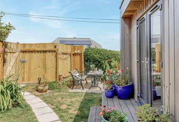 A beautifully secluded garden with space for alfresco dining.