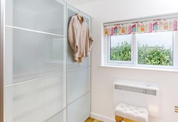 Unpack all your clothes and store them in this spacious wardrobe.