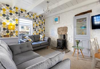 Dating back 300 years, this cosy cottage still has many traditional features.