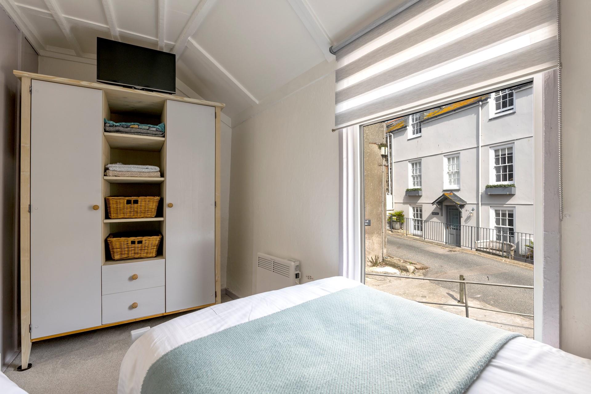 Unpack your suitcase in the ample wardrobe space.