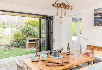 Family feasts can be enjoyed inside and out with the dining area opening out into the garden.