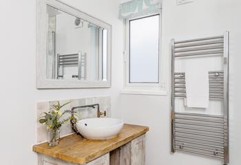 Modern style meets rustic charm in the ground floor wet room.