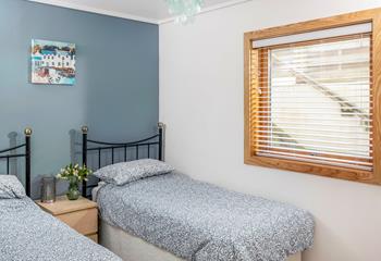 The second twin room offers another cosy space for adults or children.