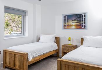 The ground floor twin bedroom is great for kids or adults, so you can get everyone together.