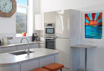 All the mod cons you need, including integrated fridge, freezer, dishwasher, microwave, electric oven and hob.