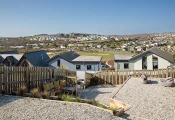 The rear garden area has a lovely seating area.