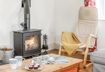 In the evenings, get cosy around the log burner.