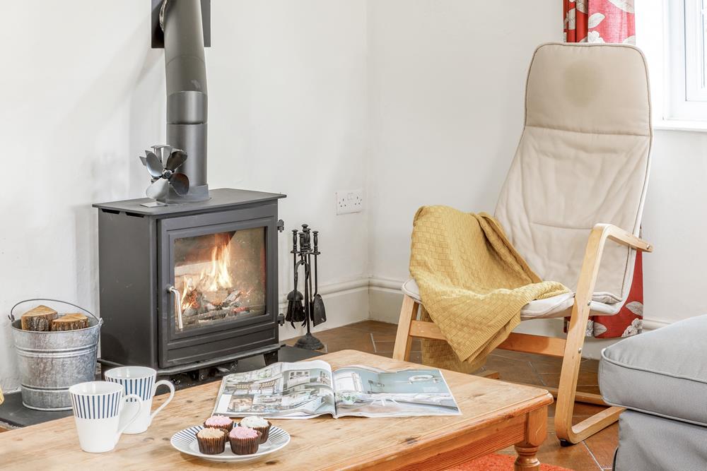 In the evenings, get cosy around the log burner.