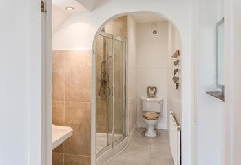 The master en suite with a rainfall shower, perfect for washing away sandy days.