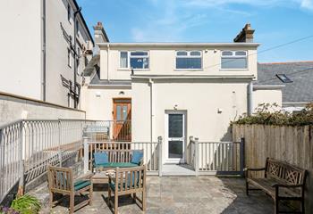 The rear courtyard is a lovely suntrap, and just moments away from the coast path.