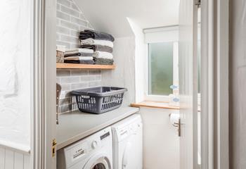 There is a handy utility room for washing and drying clothes.