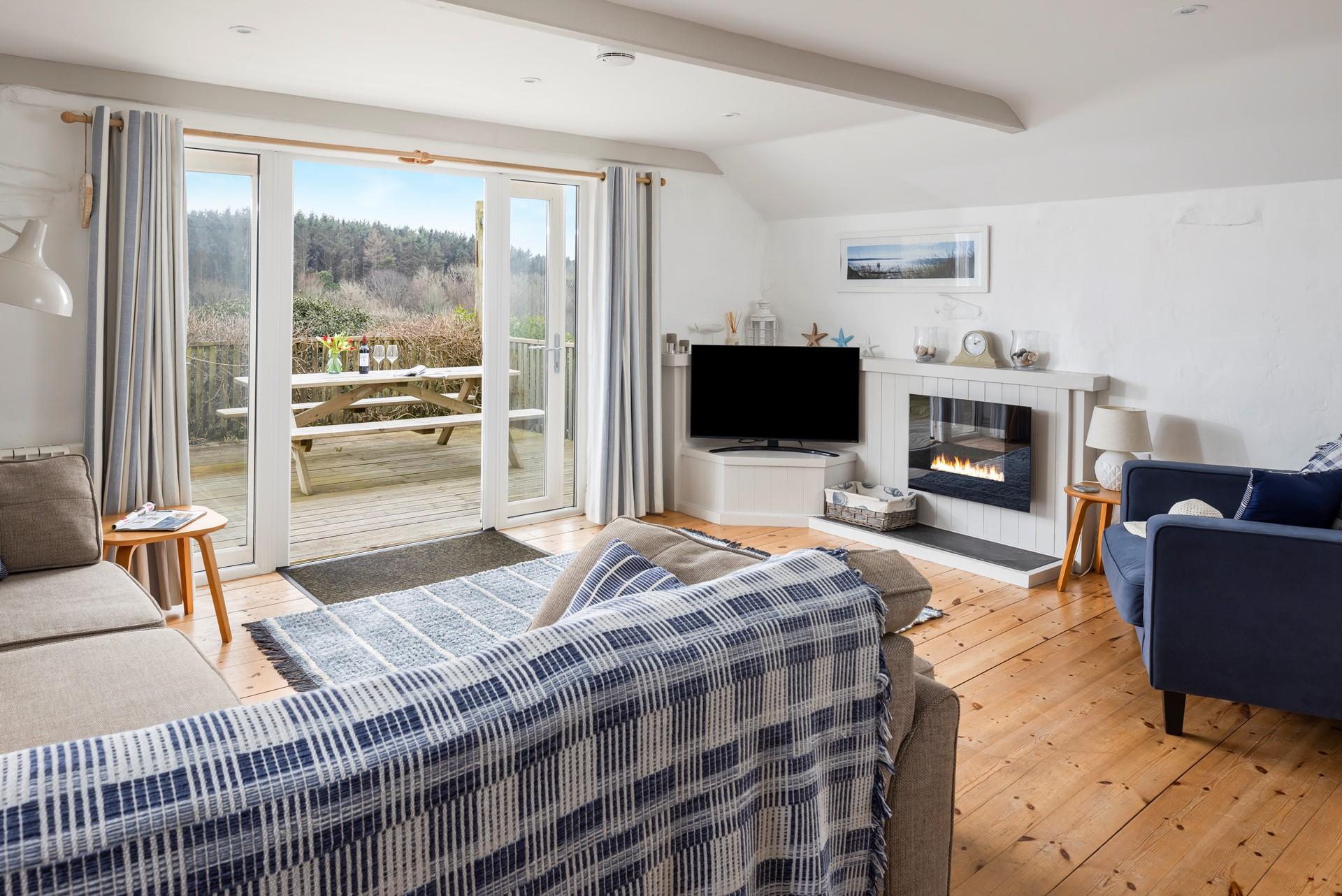 The open plan living area is ideal for spending quality time together.