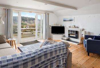 The open plan living area is ideal for spending quality time together.