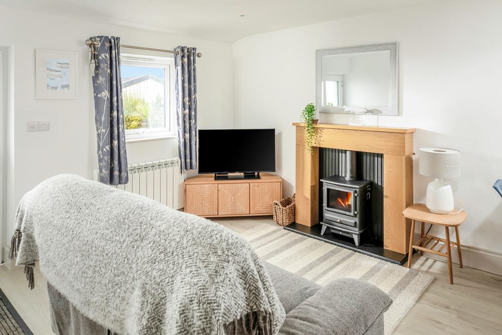 The sitting room is cosy and light.