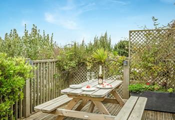 Enjoy meals al fresco in the sunny garden.