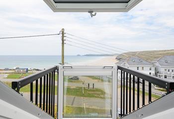 Far-reaching views across Perranporth Beach can be enjoyed from the bedrooms.