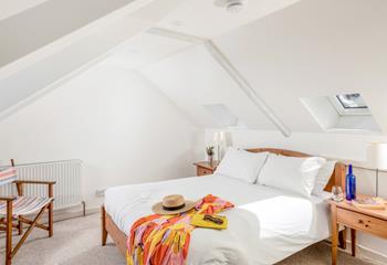 Bedroom 4 is spacious and light and has stunning sea views.