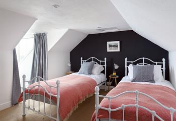 The twin beds are perfect for young adults or children to tuck into each night.