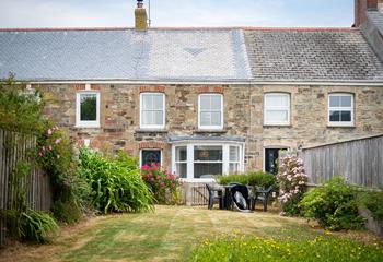 Four-legged companions will love playing in the large garden.