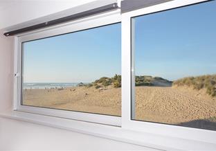 10 Sand Bay is a welcoming beachside apartment overlooking the sand and sea in Perranporth!