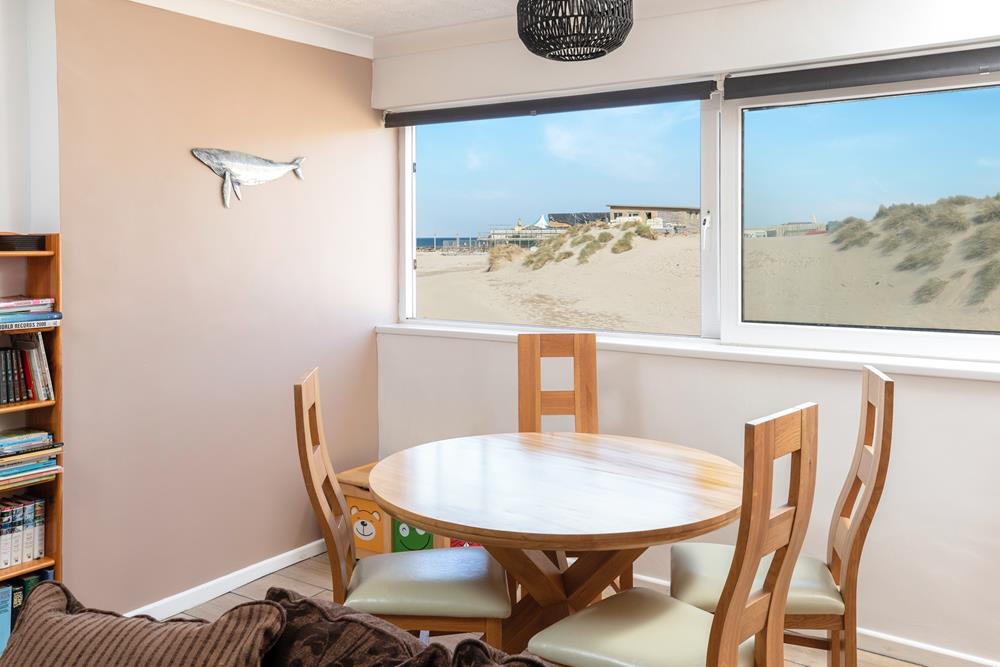 Enjoy the beach and sea views of the dunes while tucking into dinner!