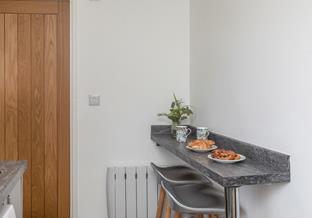 Tuck into freshly baked pastries at the handy breakfast bar before heading out to the beach.