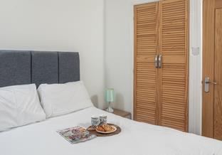A built-in wardrobe means you can easily stow away your suitcase.
