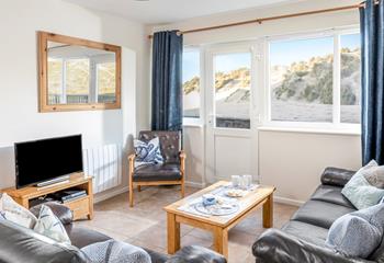 Sit back and relax and enjoy views of the spectacular sand dunes.