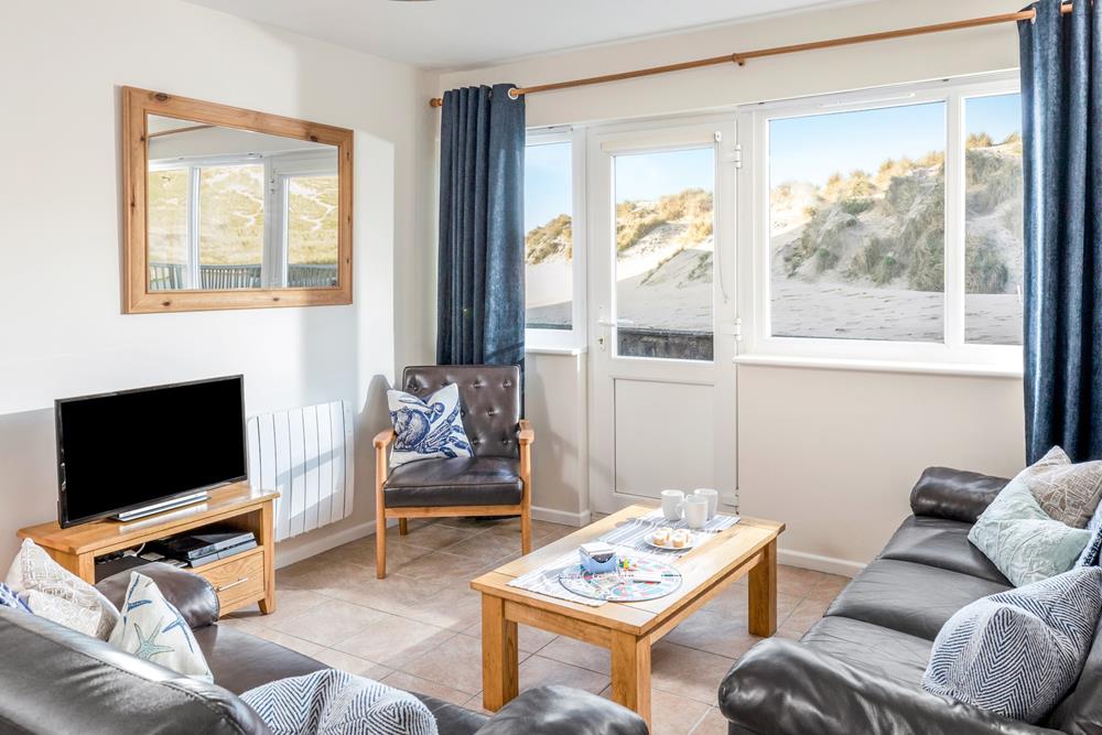 Sit back and relax and enjoy views of the spectacular sand dunes.