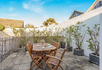 The charming patio area makes the most of the outdoors.