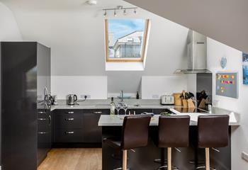 Light and modern, the stylish kitchen is a dream for keen cooks.