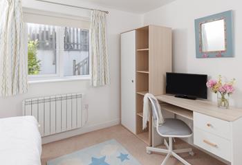 Suitable for any age, the single bedroom is calm and relaxing.
