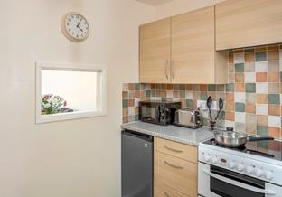 The kitchen has all the essentials you need.