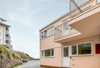 Sand Bay apartments are a level walk to the beach and high street shops, bars, and restaurants.