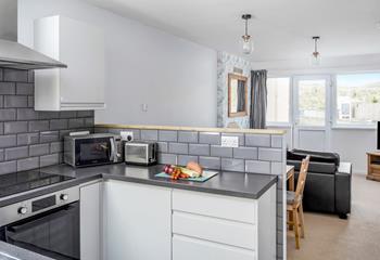 Enjoy the views as you cook in the contemporary kitchen.