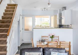 Perfect for families, 12 Sand Bay is a modern, beachside apartment.