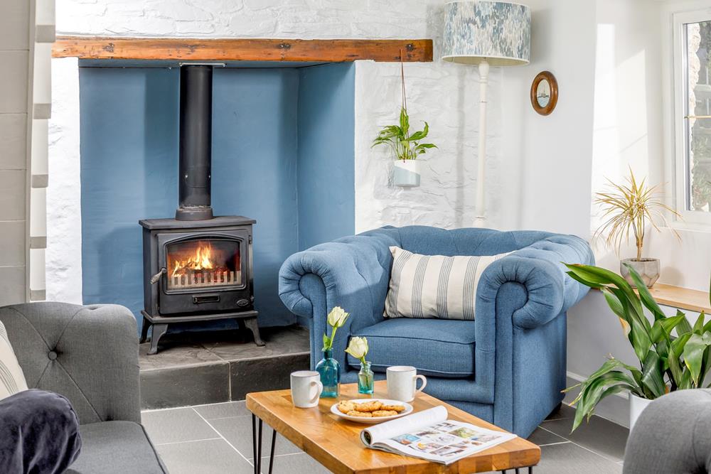 A cosy corner, curl up by the woodburner and relax.
