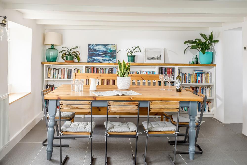 The dining space is a charming backdrop to family feasts.
