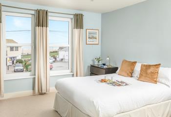 Wake up to beach views and wave watch from the comfort of the homely king bed.