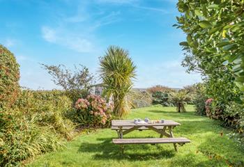 Sit in the sunshine, admiring the views of the Cornish countryside and beyond.