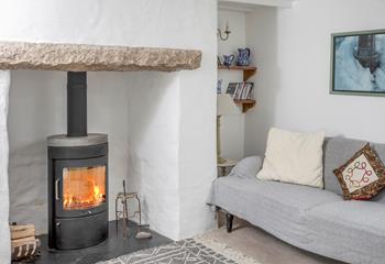 The woodburner makes 1 Pen Mor Cottage perfect for an out-of-season break.