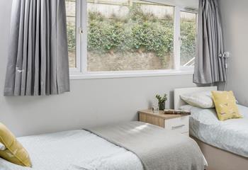 The cosy second bedroom has plenty of storage space for all the holiday essentials.