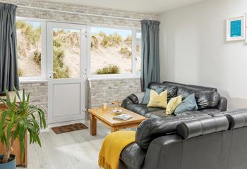 Located next to Perranporth's beach and sand dunes, beachside holidays don't get much closer!