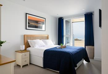 Wake up to beautiful views across sand and sea.