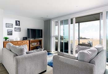 Spend days exploring Perranporth's three miles of golden sands before relaxing on the sea-facing sofas.