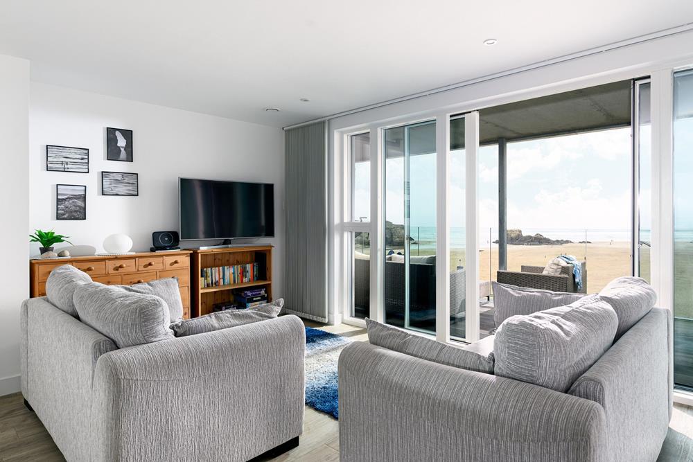 Spend days exploring Perranporth's three miles of golden sands before relaxing on the sea-facing sofas.