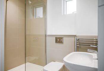 The master en suite is perfect for a hot shower after a day in the sea.