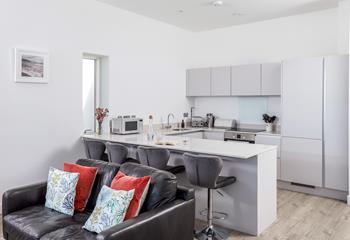 The open plan kitchen lets you admire the view whilst cooking.