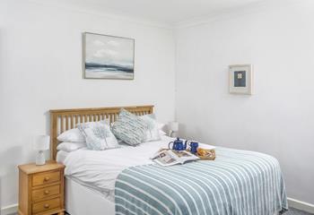 Tranquil sea blues adorn the double bedroom.